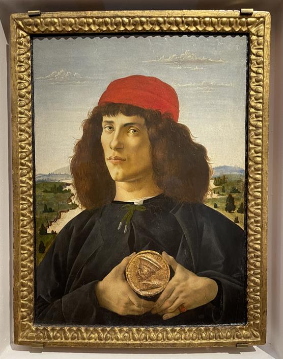 ▲ '메달을 들고 있는 청년 초상화'(Portrait of a Young Man holding a Medallion, 1475, 나무 위 템페라, 51.5x44cm, 우피치 미술관)